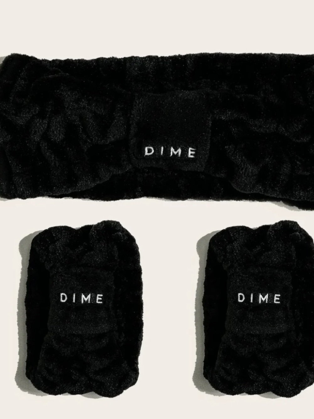 New! Never opened. Dime headband & wristband set for facial washing